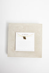 green elephant necklace