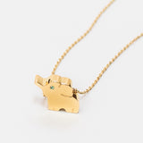 green elephant necklace
