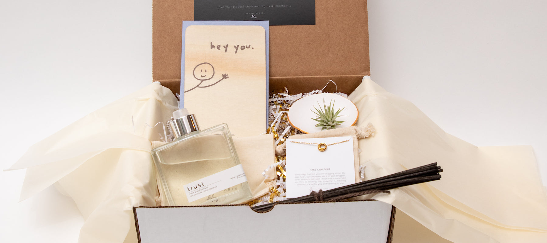 A gift bundle with reed diffuser with non-toxic base + clean fragrance. Also included, empathy card, a meaningful necklace and jewelry dish stamped with the word, worthy. A great gift to let someone know you're thinking of them.