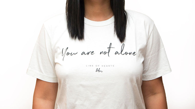 you are not alone with logo tee